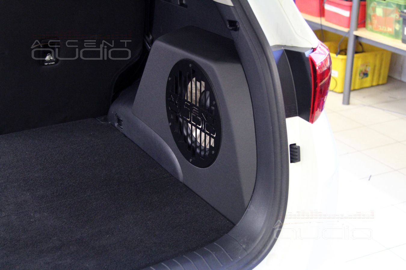Сабвуфер в новом Kia Sportage.