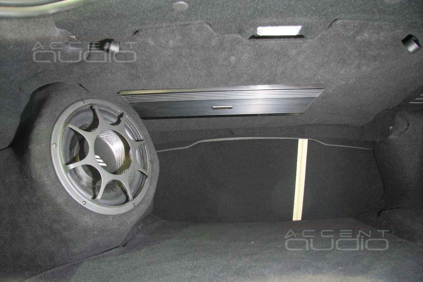 Установка усилителя и сабвуфера в Jaguar XF