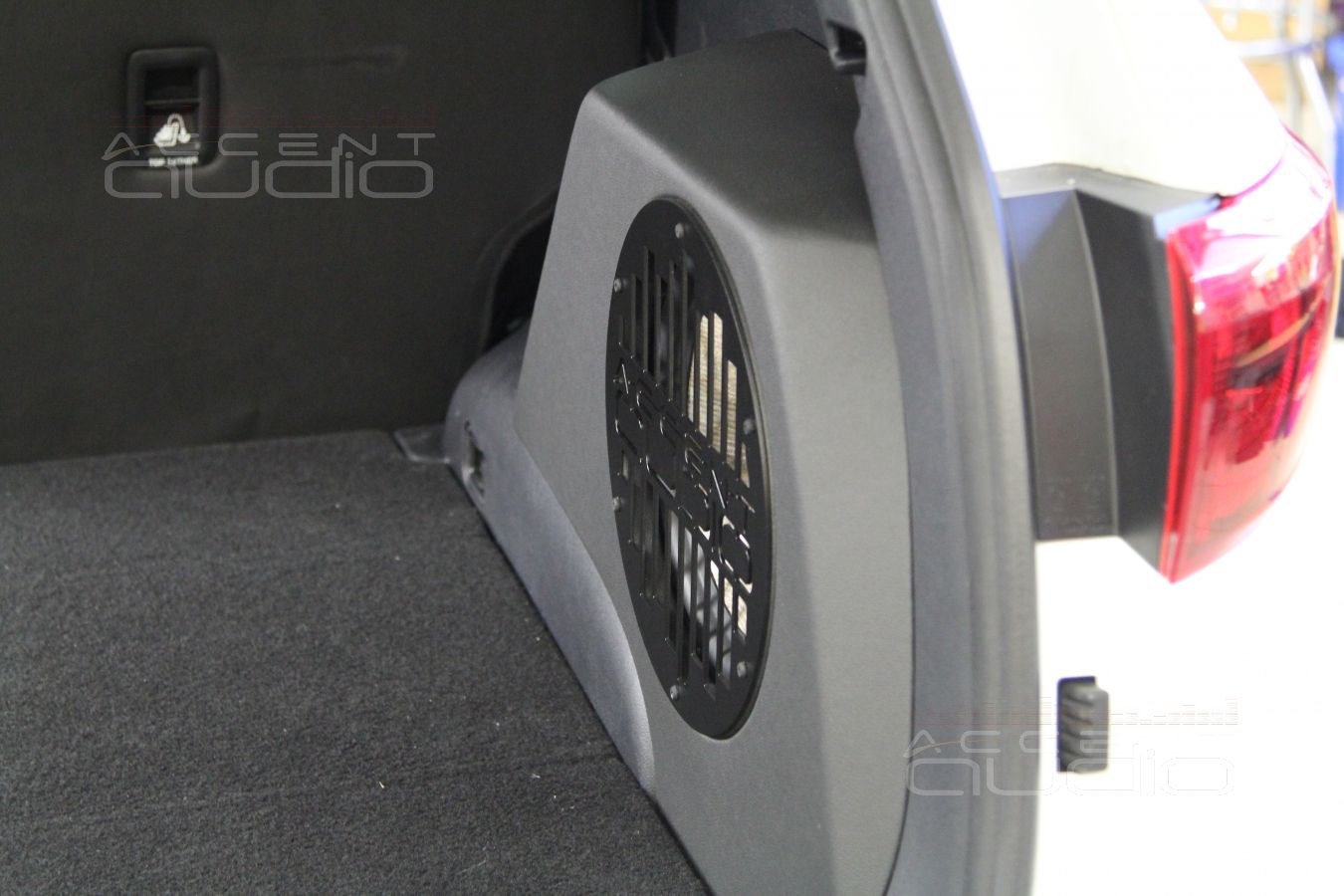 Сабвуфер в новом Kia Sportage.