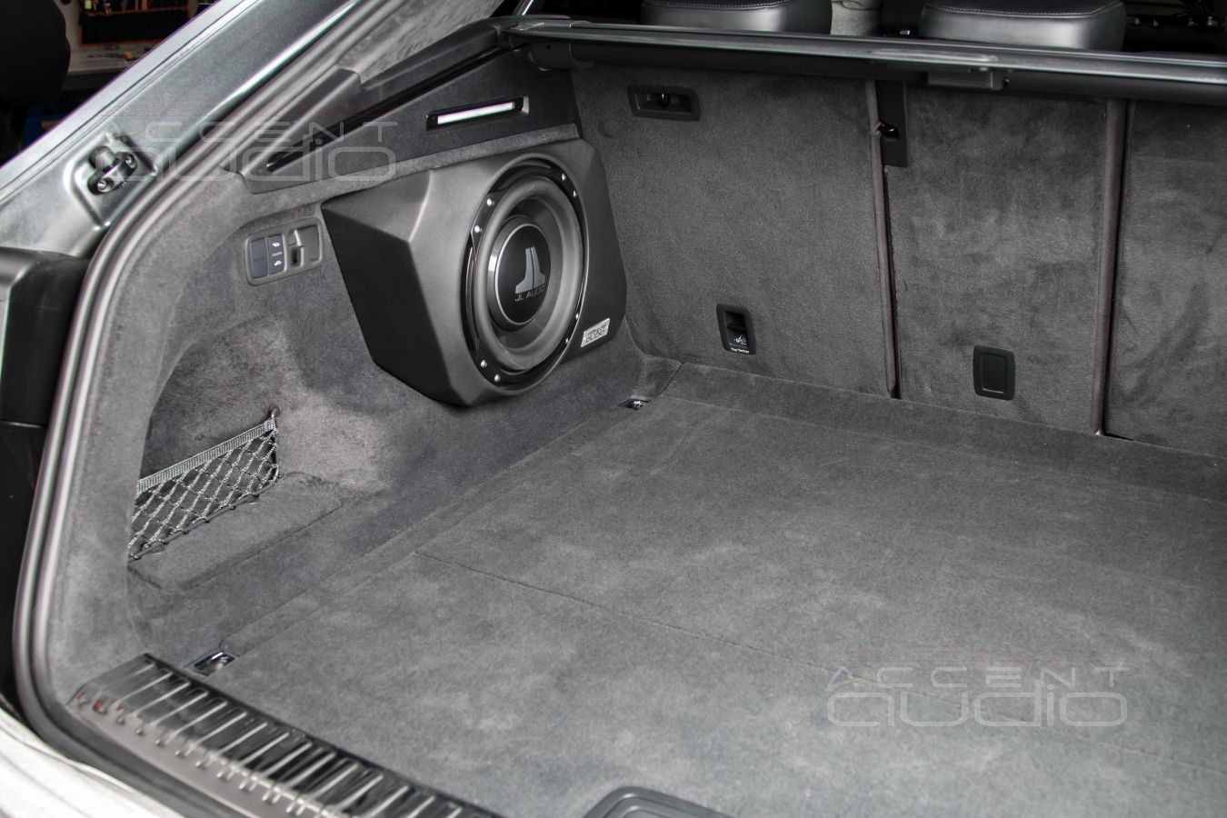 Новое решение: настоящий сабвуфер-стелс для Audi Q8