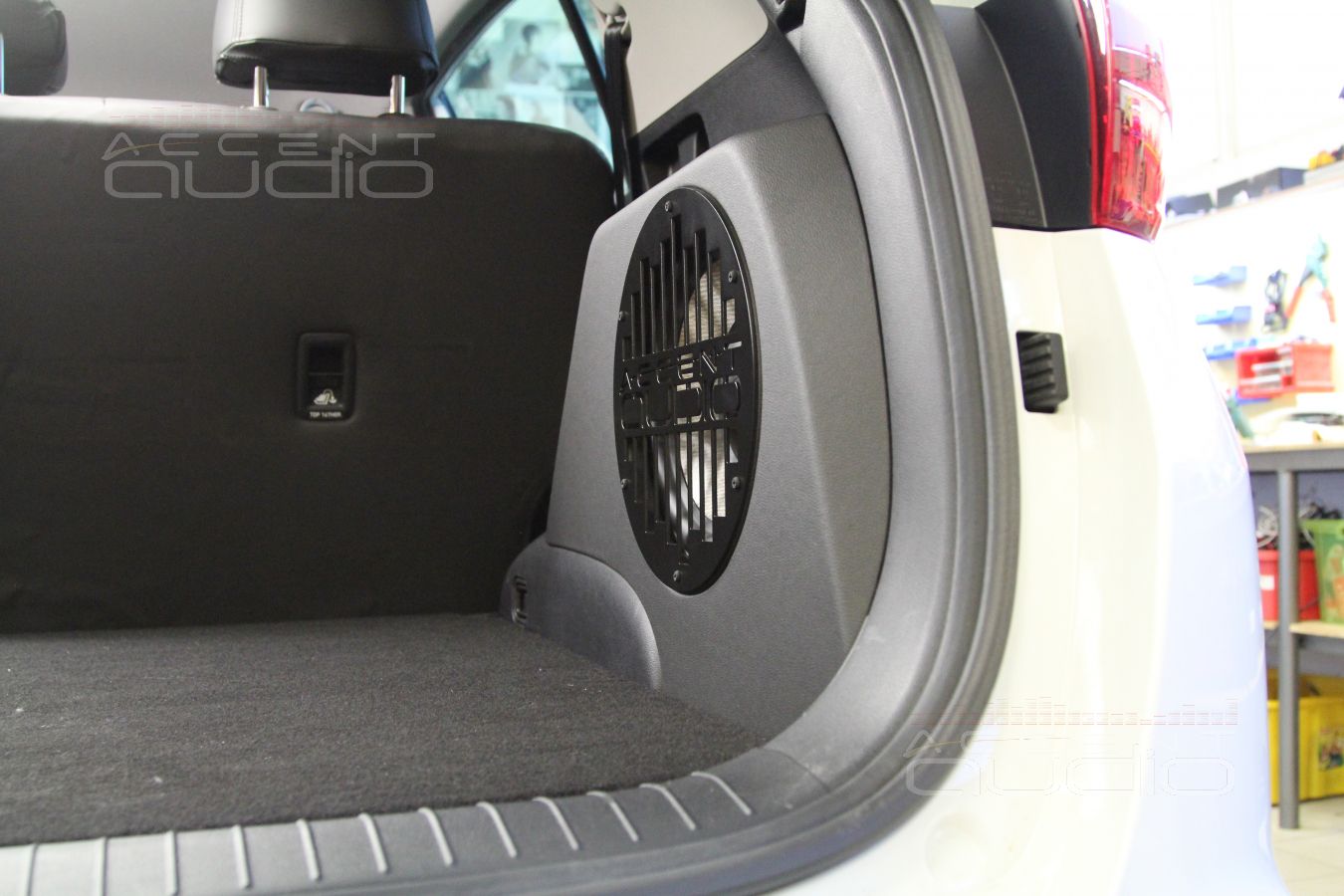 Сабвуфер в новом Kia Sportage.