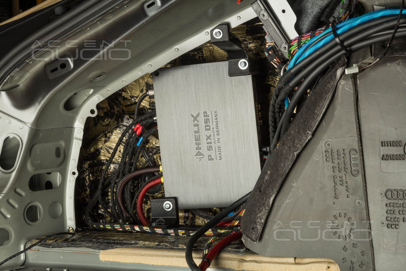 Технологии заводского монтажа: установка усилителей в Audi A7