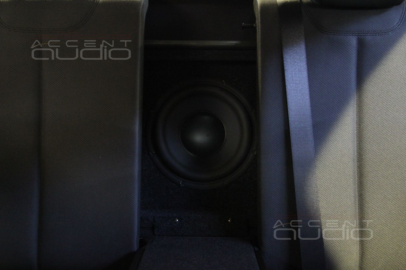 Варианты скрытого размещения сабвуферов в BMW F30