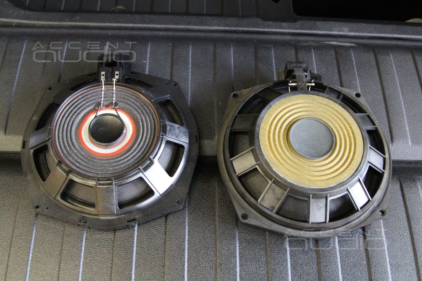 Установка подсидельных мидбасов Eton в BMW X5