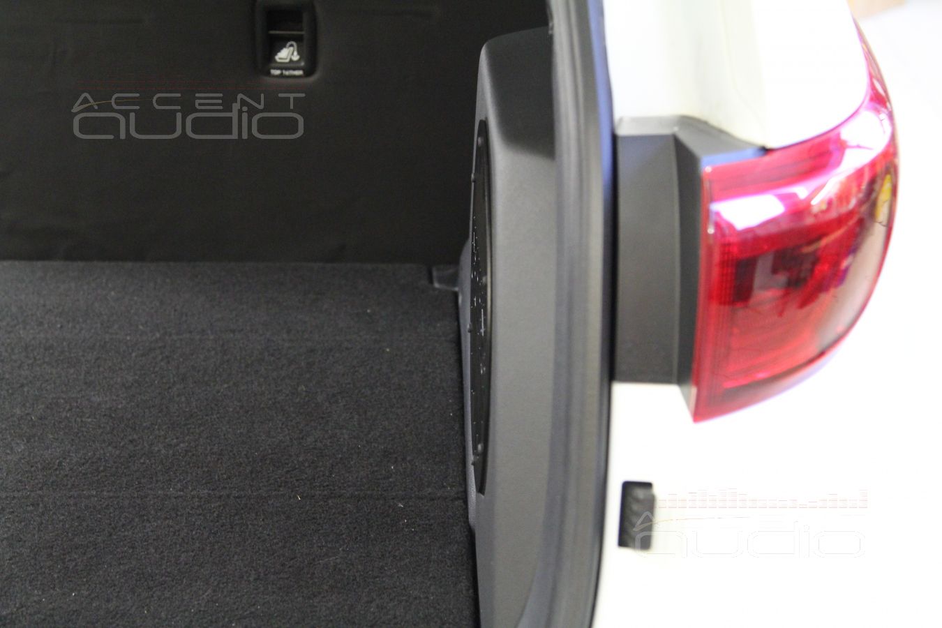 Сабвуфер в новом Kia Sportage.