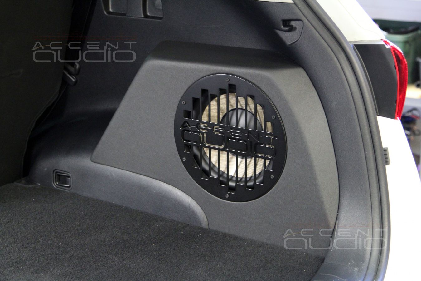 Сабвуфер в новом Kia Sportage.