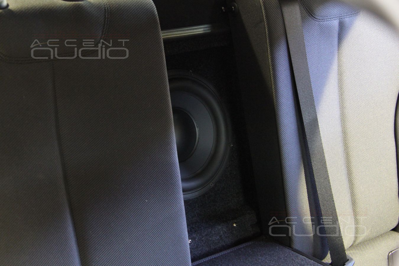 Варианты скрытого размещения сабвуферов в BMW F30