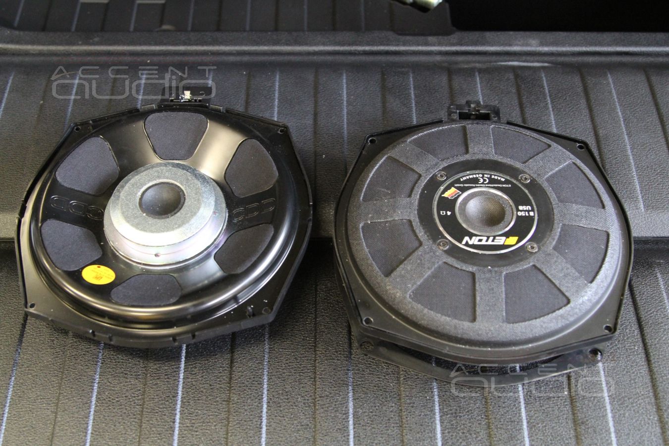 Установка подсидельных мидбасов Eton в BMW X5