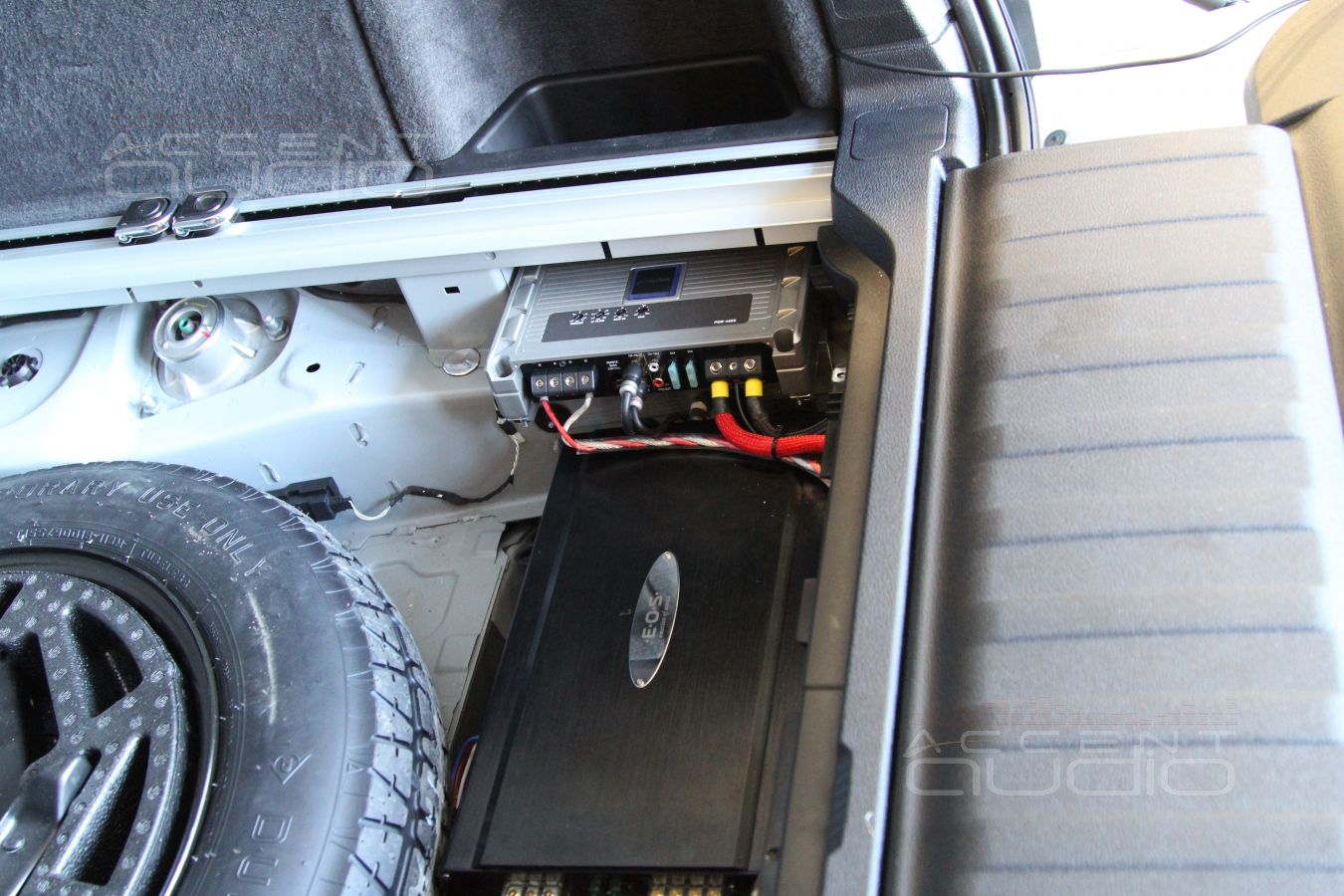 Сабвуферный усилитель в BMW X5