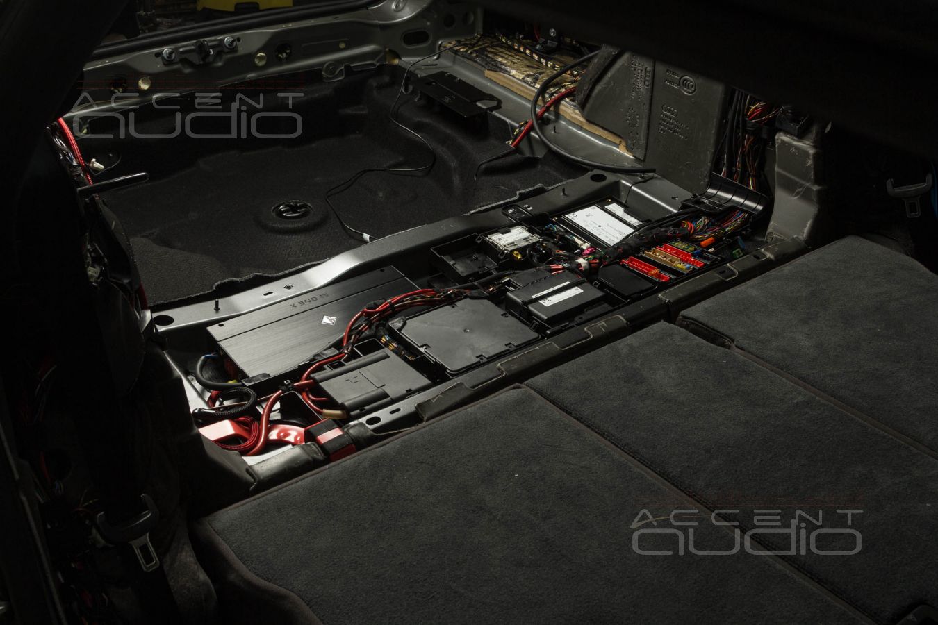 Технологии заводского монтажа: установка усилителей в Audi A7