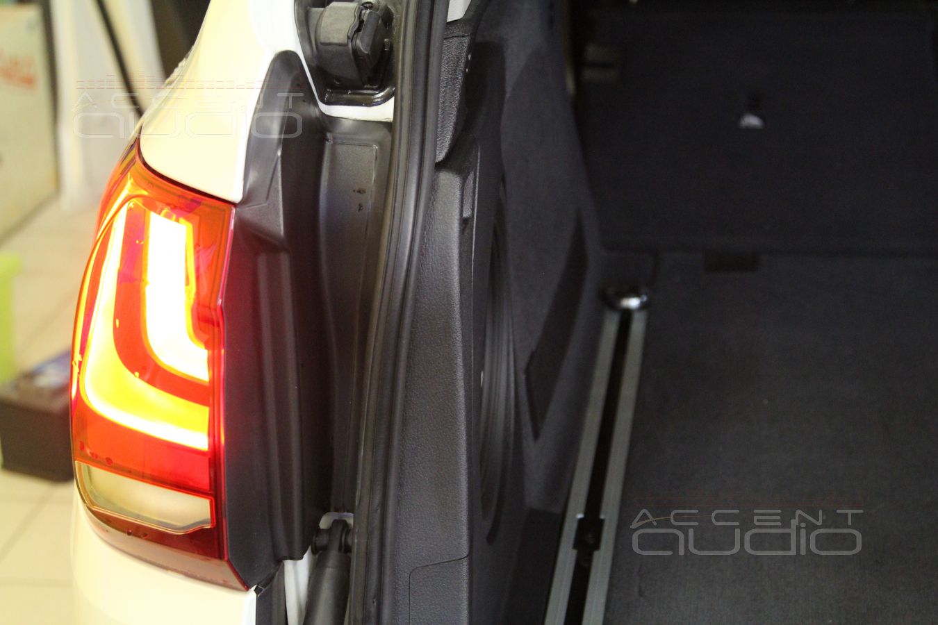 Сабвуферный усилитель в BMW X5