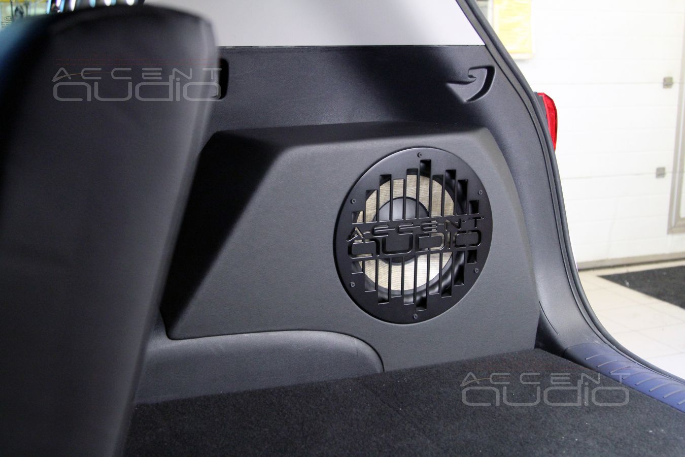 Сабвуфер в новом Kia Sportage.